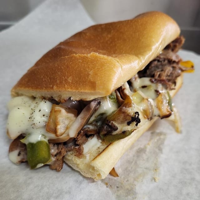 4 Medium Steak & Cheese Subs & Family Fry.